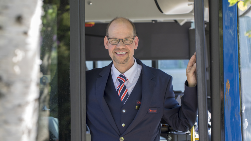 En glad bussförare